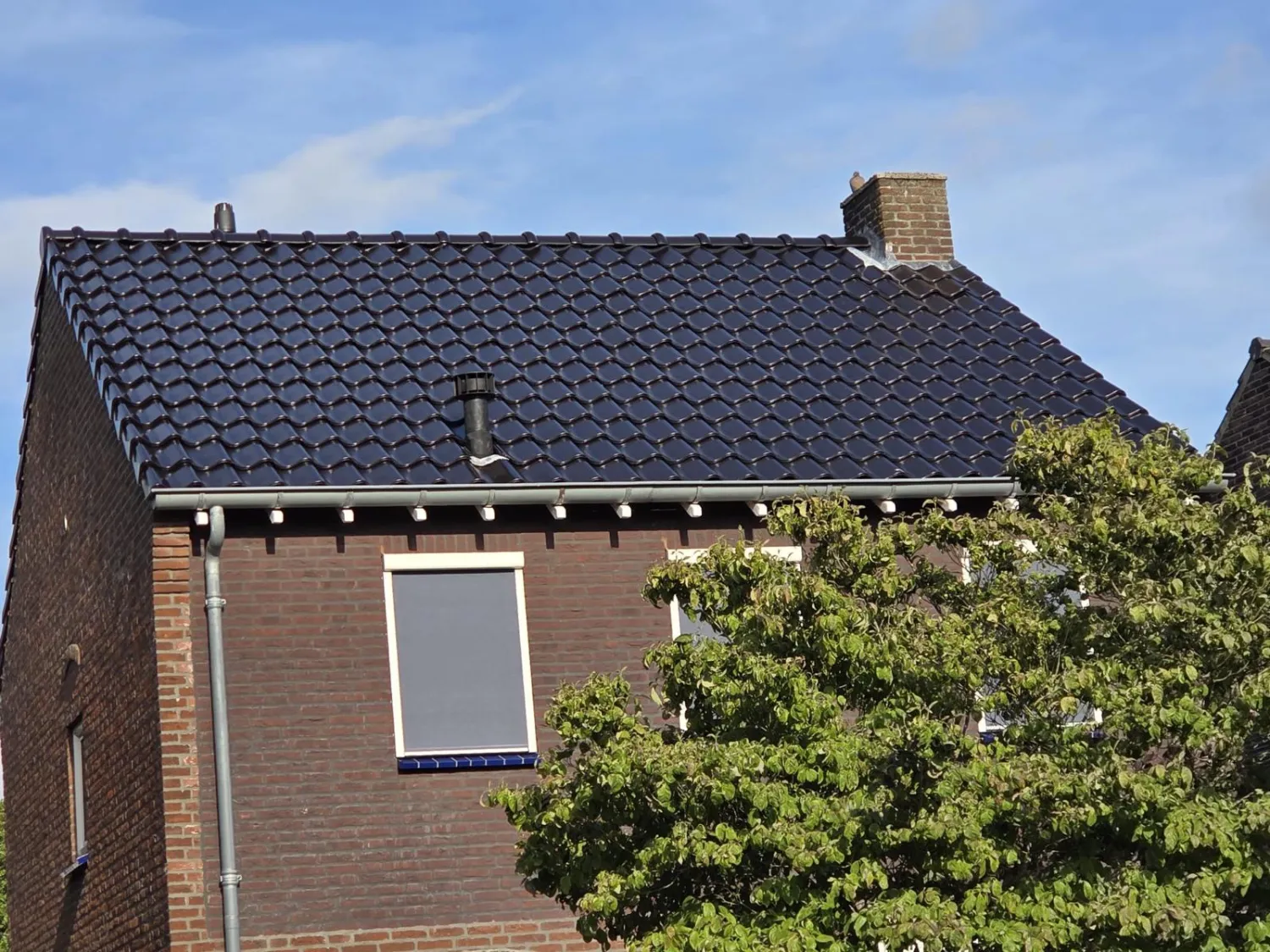 Dakrenovatie huis met pannendak