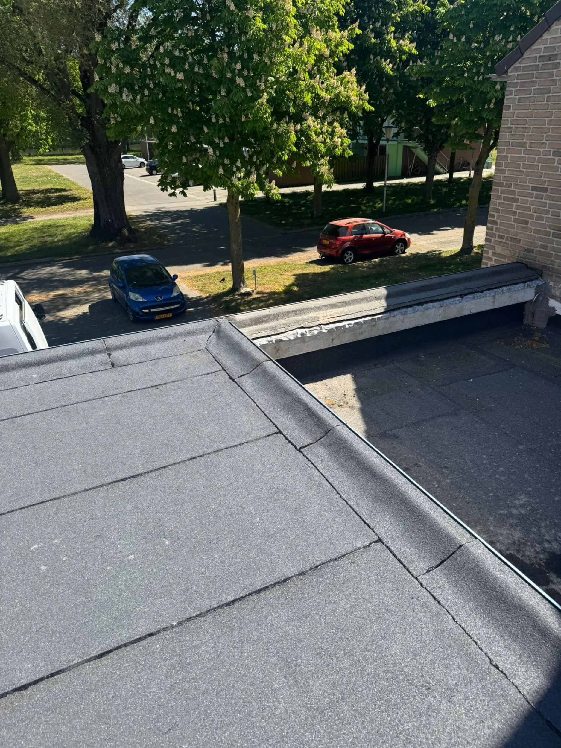 Plat dak vervangen woning in Helmond