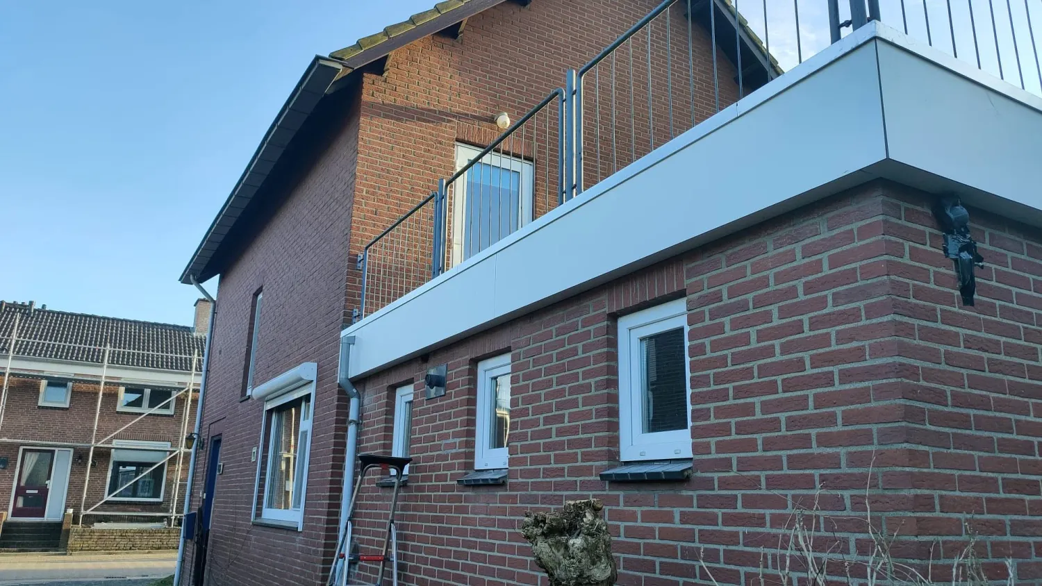 Afwerking renovatie plat dak swalmen