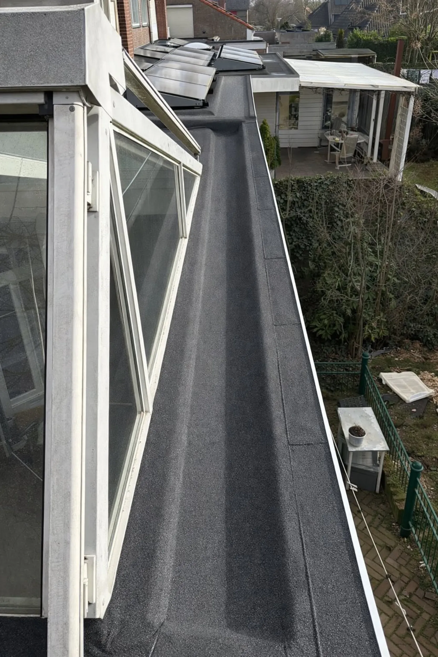 Plat dak renovatie en afwerking