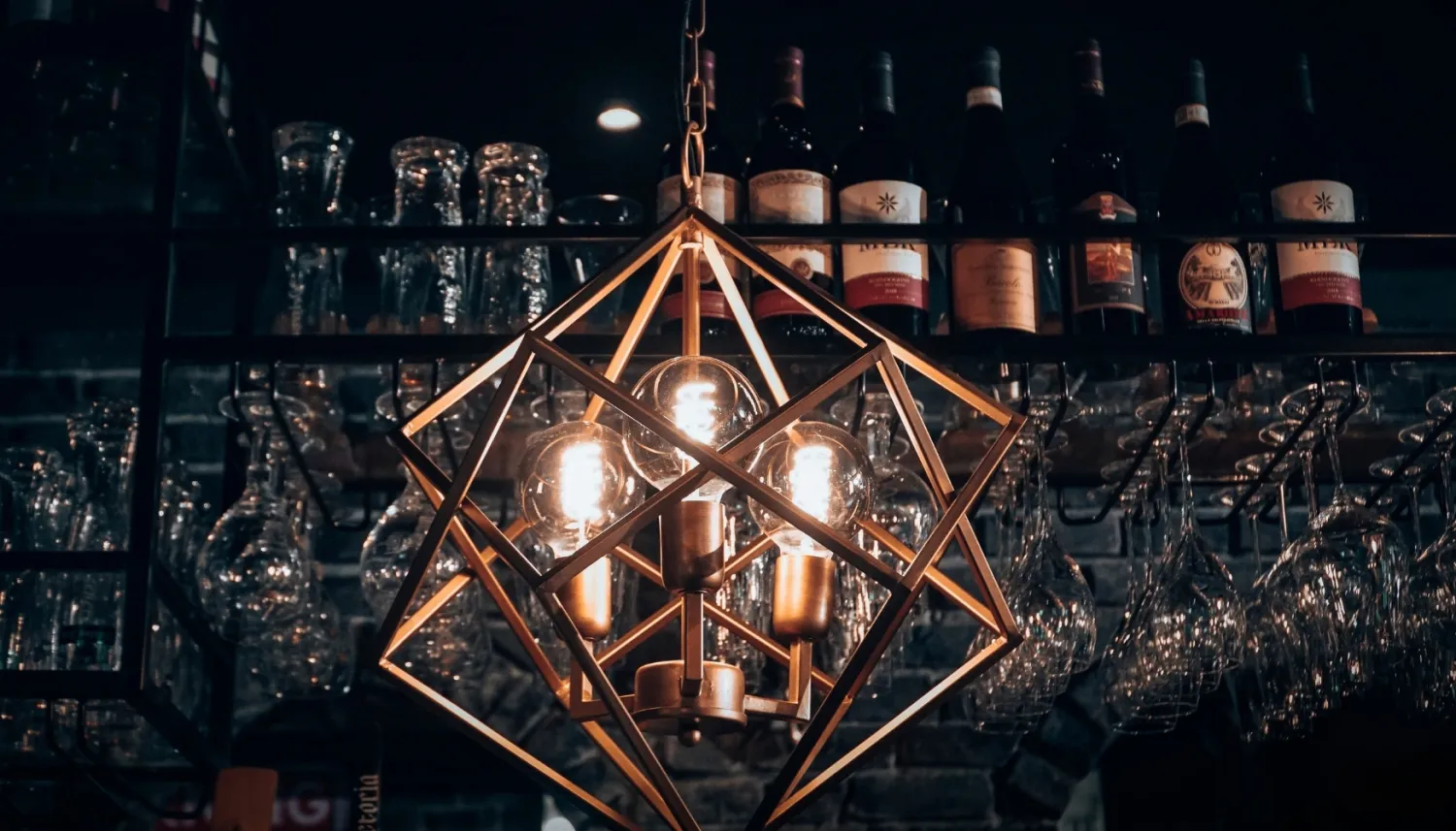 Atmospheric lighting above the wine bar